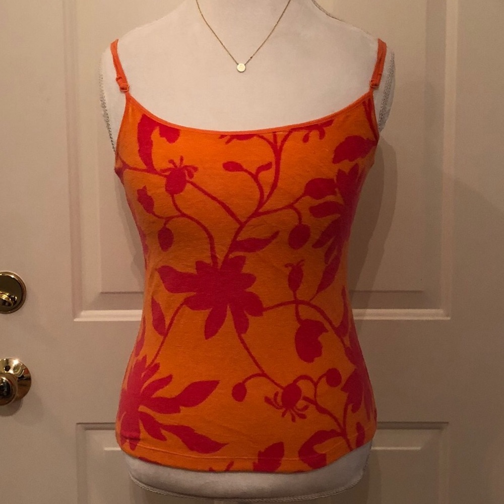 Harold’s orange and red tank top